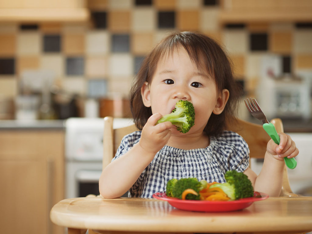 baby girl eating at a Preschool & Daycare Serving Greenville, AL