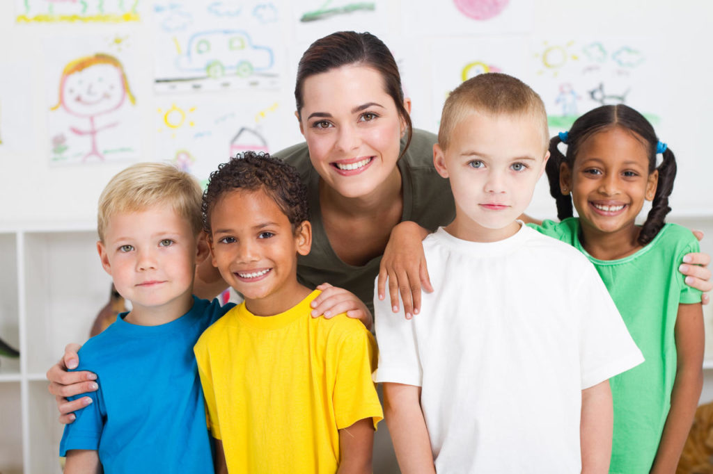 Career young teacher and kindergarten students - Serving Greenville, AL